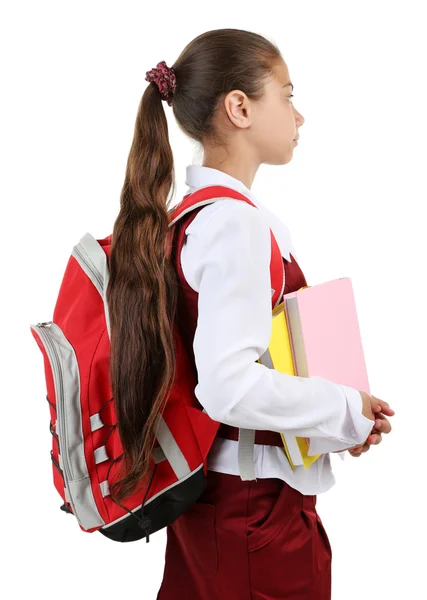Linda menina em uniforme escolar isolado no branco — Fotografia de Stock