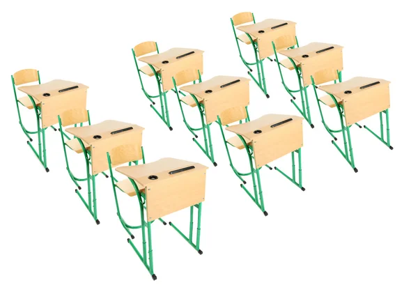 School wooden desks and chairs isolated on white — Zdjęcie stockowe