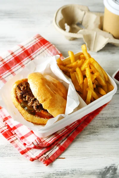 Tasty burger and french fries — Stock Photo, Image