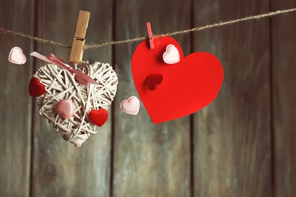 Hearts hanging on rope — Stock Photo, Image
