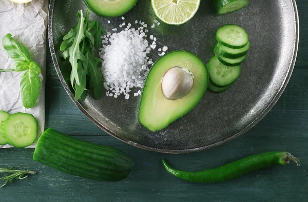 Sliced avocado, cucumber — Stock Photo, Image