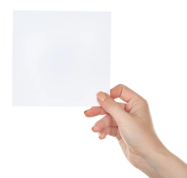 Mano que sostiene la tarjeta en blanco aislada en blanco — Foto de Stock