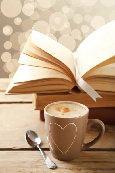 Cup of coffee and book — Stock Photo, Image