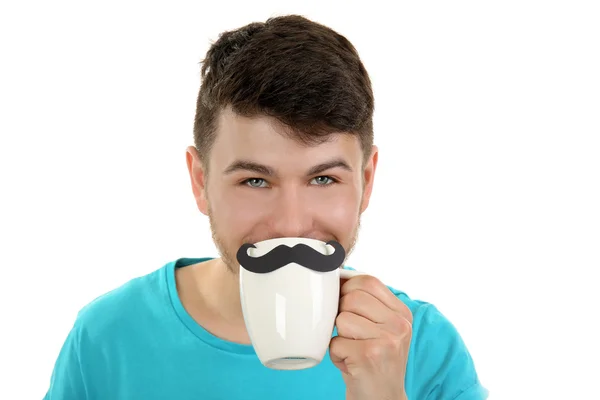 Porträtt av man dricka från cup med cutout mustasch, isolerad på vit — Stockfoto