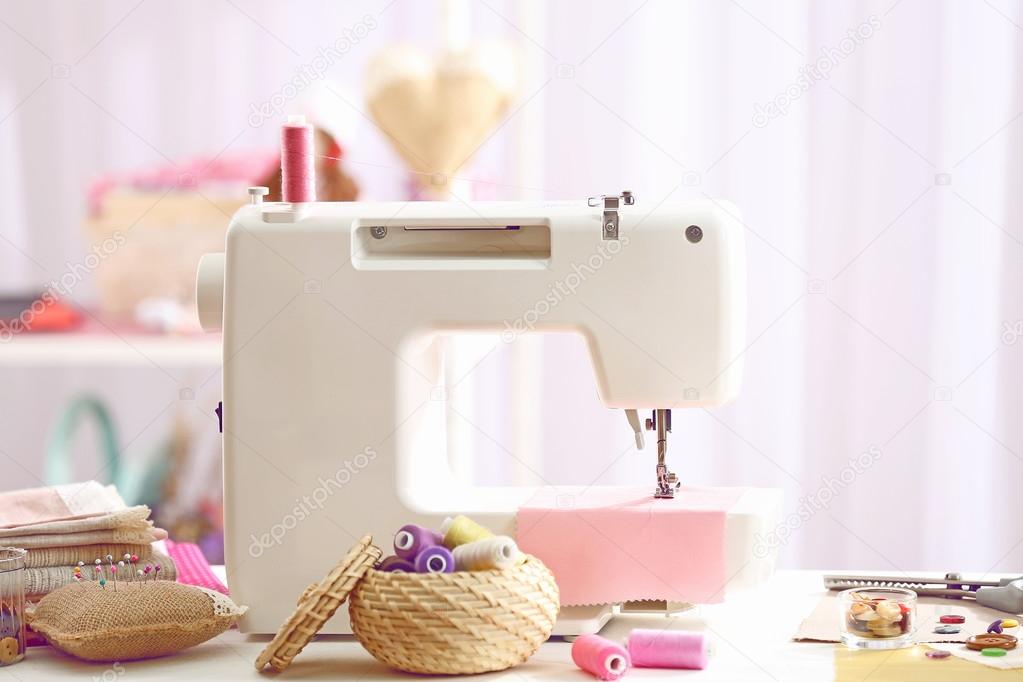 Sewing machine on table — Stock Photo © belchonock 76536553