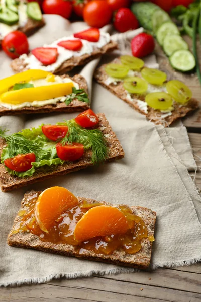 Still life with vegetarian sandwiches on wooden table — Stock Photo, Image