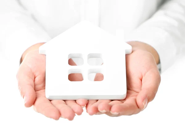 Female hands holding house, closeup — Stock Photo, Image