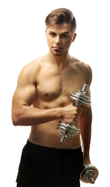Muscolo giovane uomo in possesso di manubri isolati su bianco — Foto Stock