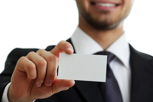 Elegant man in suit holding business card close up — Stock Photo, Image