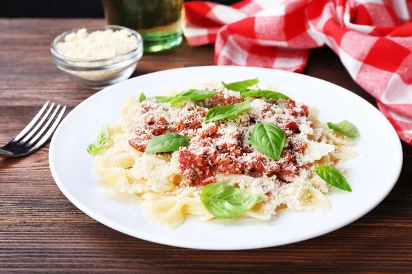 Pasta bolognese on wooden table, closeup — Stock Photo, Image