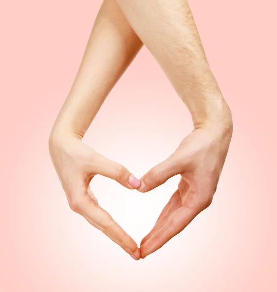 Hands in shape of heart on light background — Stock Photo, Image