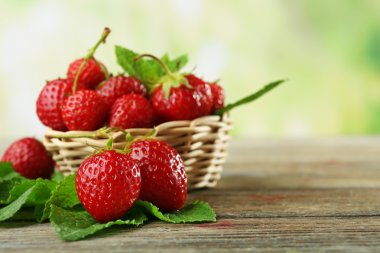 Ripe strawberries with leaves clipart