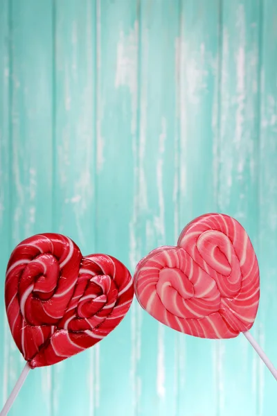 Bright lollipops in shape of heart — Stock Photo, Image