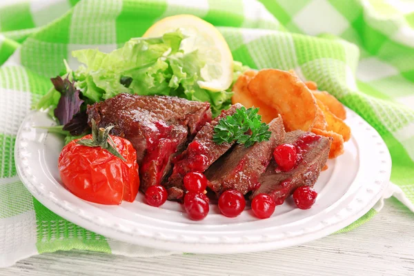 meat with cranberry sauce