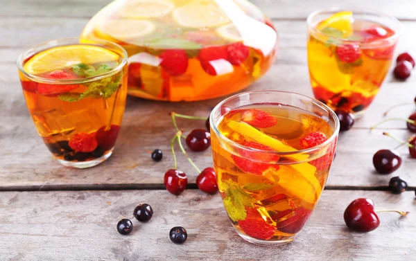 Punch with berries in glassware — Stock Photo, Image