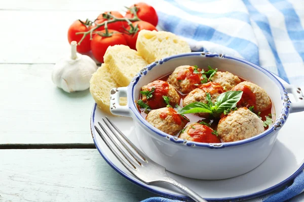 Meat balls with tomato sauce, on wooden background — Stock Photo, Image