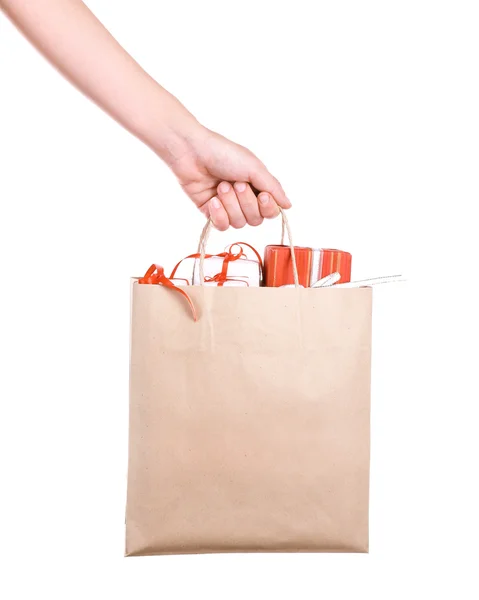 Female hand holding paper bag — Stock Photo, Image