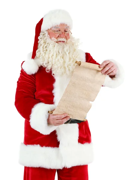 Papai Noel segurando lista de desejos, isolado em fundo branco — Fotografia de Stock