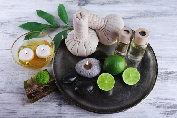 Beautiful composition of spa treatment on tray, on light background — Stock Photo, Image