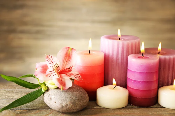 Candles with alstroemeria close up — Stock Photo, Image