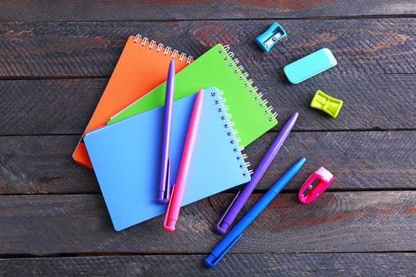 Colorful stationery on wooden table, closeup — Stock Photo, Image