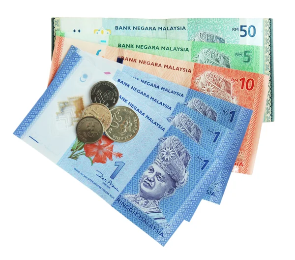 Banconote e monete metalliche isolate su banconote bianche — Foto Stock