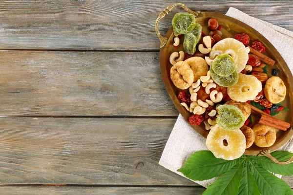 Assortment of dried fruits on wooden table, closeup — Stock Photo, Image