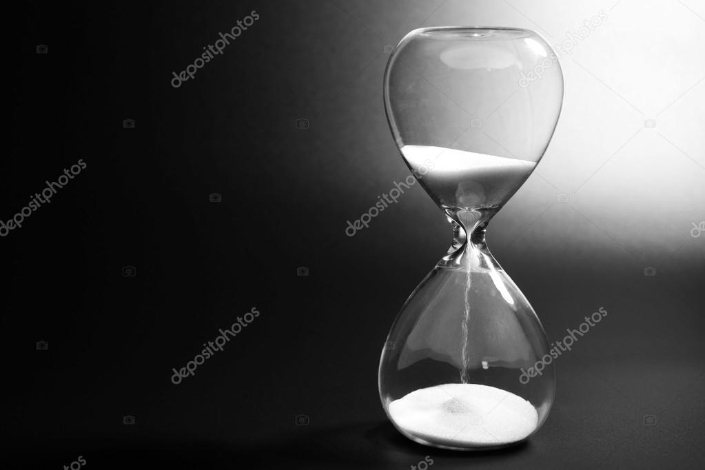 Hourglass on dark background