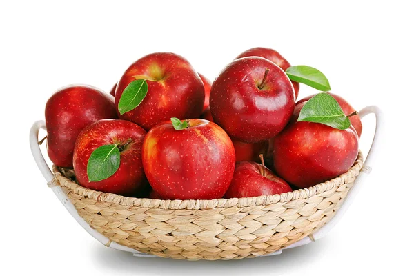 Ripe red apple in wicker basket — Stock Photo, Image