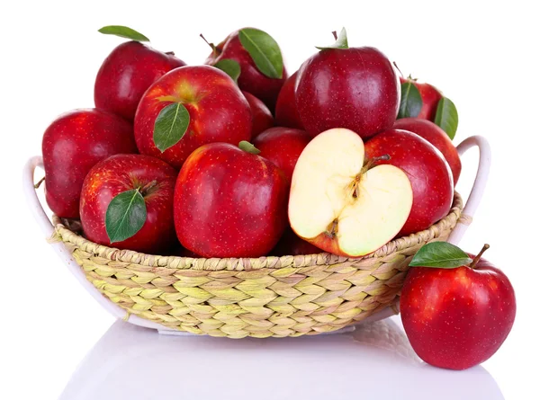 Ripe red apple in wicker basket — Stock Photo, Image