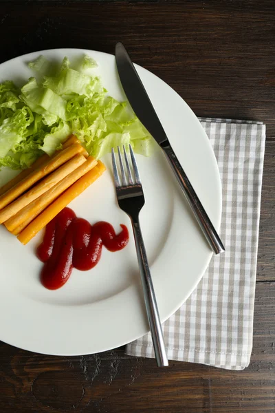 Suluguni cheese with sauce and salad on table close up — Stock Photo, Image