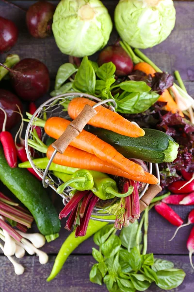 Heap of fresh vegetables on table close up — Stock Photo, Image