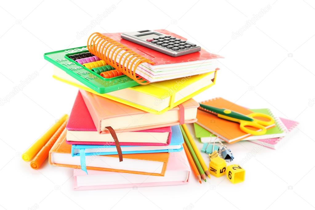 Stack of books and stationery isolated on white
