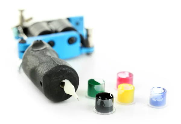 Tattoo machine with colorful ink — Stock fotografie