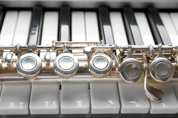 Flute and piano close up — Stock Photo, Image