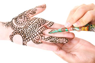 Image of henna applied on female hand isolated on white clipart