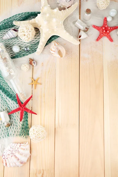 Beautiful sea composition with shells on wooden background — Stock Photo, Image