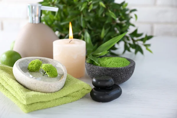 Beautiful composition of spa treatment on white wooden table — Stock Photo, Image