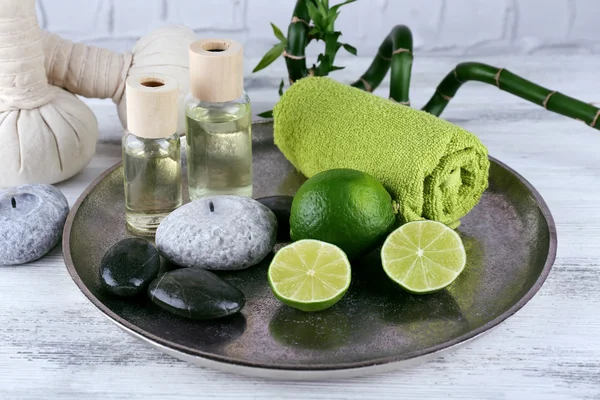 Beautiful composition of spa treatment on tray, on light background — Stock Photo, Image