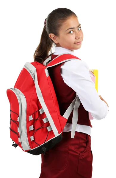 Beautiful little girl in school uniform isolated on white — Stock Photo, Image