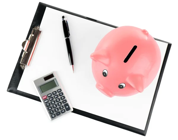 Piggy bank with calculator and clipboard isolated on white — Stock Photo, Image