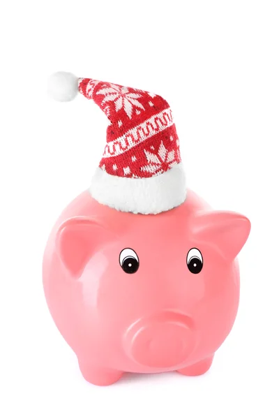 Piggy bank a Santa kalap elszigetelt fehér — Stock Fotó