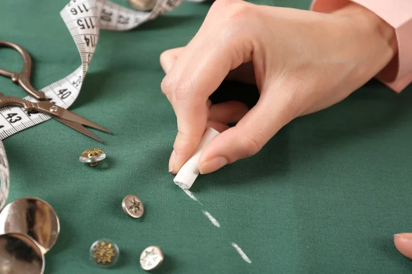 Closeup hands of seamstress at work with cloth fabric — Stock Photo, Image