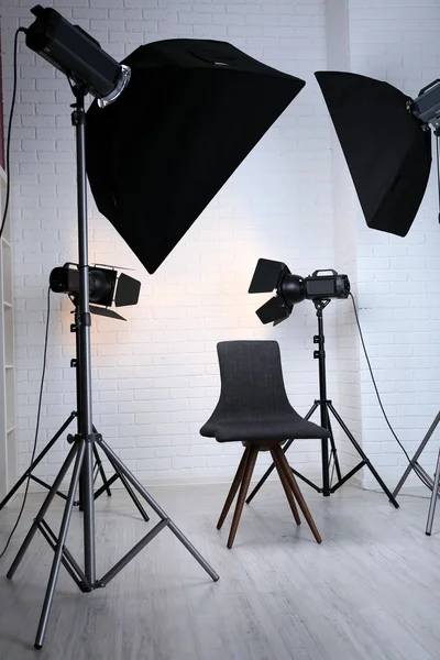 Photo studio with modern interior and lighting equipment — Stock Photo, Image