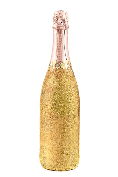 Ljusa flaska champagne på papper bakgrund — Stockfoto