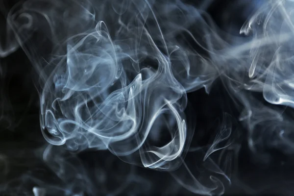 Color smoke from match on dark background — Stock Photo, Image