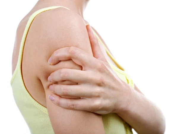 젊은 여성 흰색 절연 어깨 통증을 — 스톡 사진