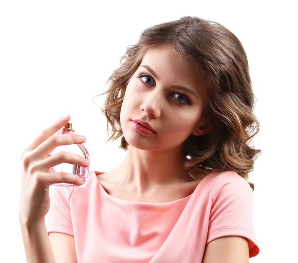 Hermosa mujer con frasco de perfume aislado en blanco — Foto de Stock