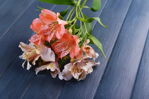Beautiful alstroemeria on wooden background — Stock Photo, Image