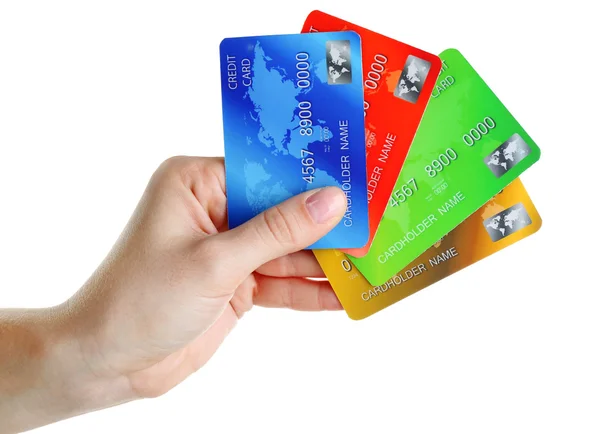 Cartões de crédito à mão, isolados sobre branco — Fotografia de Stock